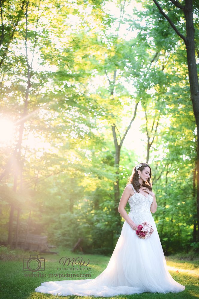 A Bride Holding Flowers in the Park, Wedding Photography