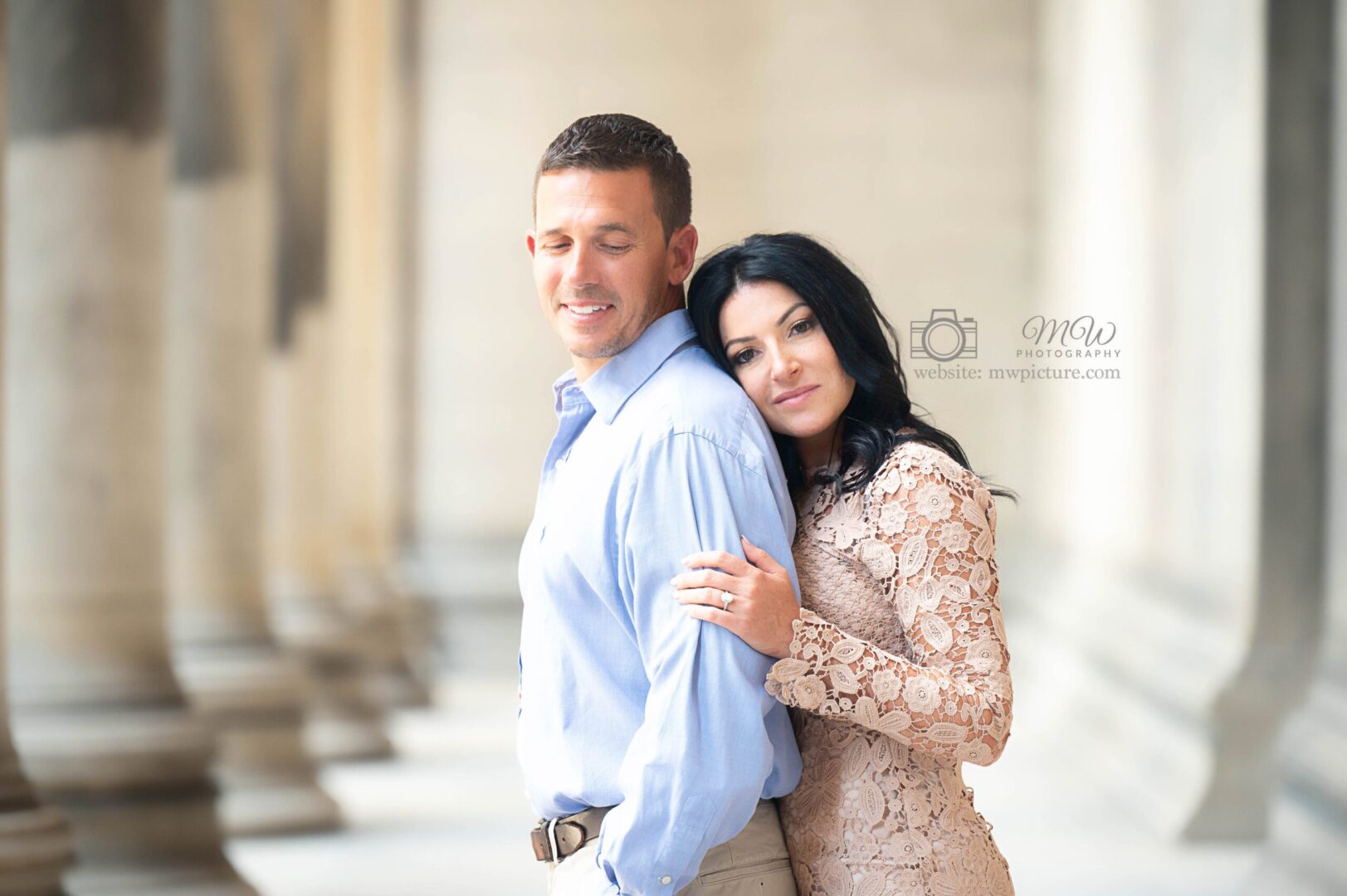 A man and woman posing for a picture.
